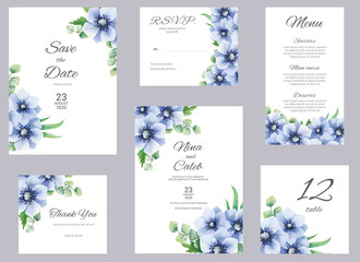 Watercolor bkue anemone and eucapyptus wedding invitation. Set with invitation, Save the date, Thank you card, RSVP, menu and table number on white marble background. Wedding set.