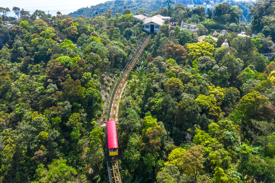 Aerial view of climbing train, a fascinating experience for tourists at the famous tourist area on Ba Na mountain, Da Nang, Vietnam. Near Golden bridge