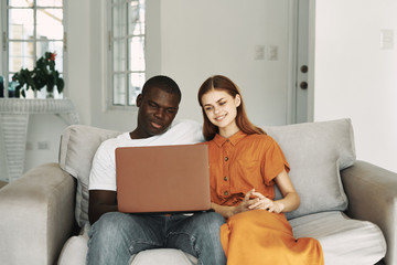 couple using a laptop