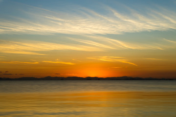 Naklejka na ściany i meble Sunset sky with beautiful cloud in golden time.