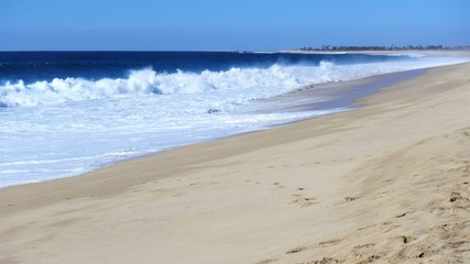 waves breaking on the beach