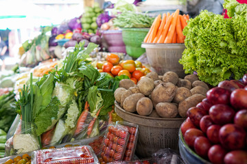 Variety of colorful vegetables and fresh at a market stall
