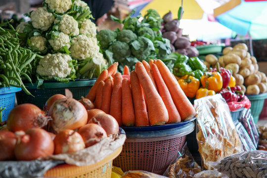 Variety of colorful vegetables and fresh at a market stall