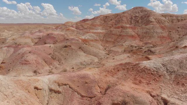 Amazing aerial view above the colorful rocks of Tsagaan Suvarga, Gobi, Mongolia