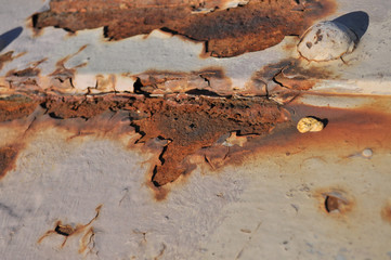 Rusty surface close-up with grey painting