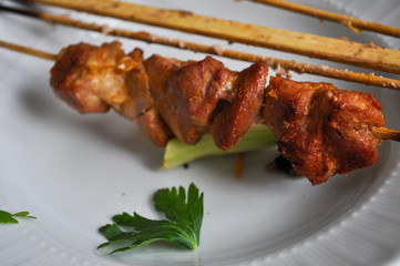 Chicken skewer on a plate