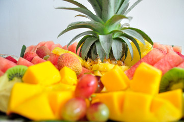 Exotic sliced fresh fruits platter arrangement