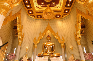 Fototapeta na wymiar Golden buddha statue in Temple of the Golden Buddha in Bangkok, Thailand 
