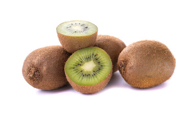 Kiwi fruit with pieces isolated on a white background, close-up.