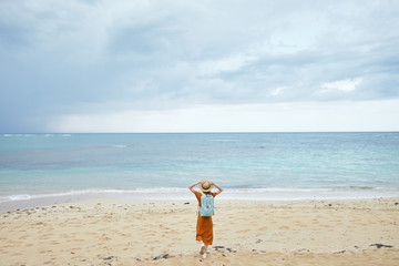 young couple walking on the beach