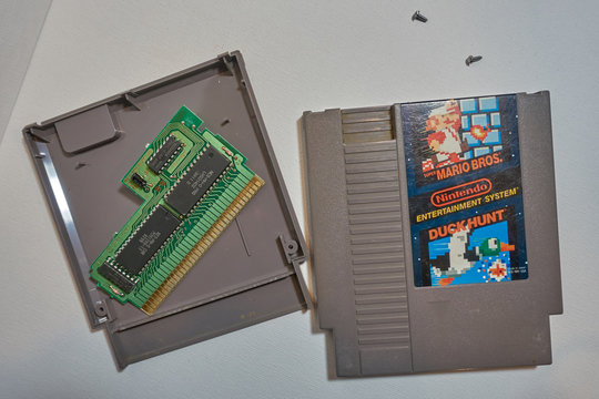 Tiffin, Iowa, USA - 12/2018: Nintendo NES Mario Cartridge With Circuit Board                   