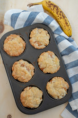 Home made banana muffins on the wooden table