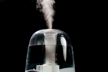 Aroma oil diffuser or air humidifier, increase in air humidity indoors.