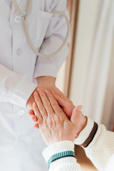 Asian aged woman and doctors