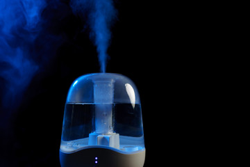 Aroma oil diffuser or air humidifier, increase in air humidity indoors.