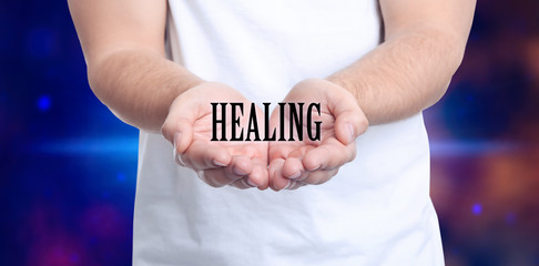 Closeup view of man on color background. Healing concept