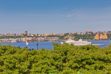 Fototapeta na wymiar Water transport on the West Hudson River near the Manhattan Island.