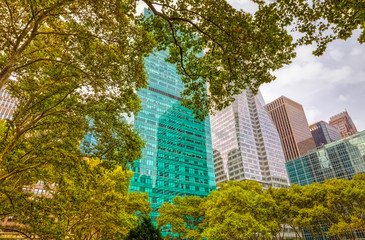 Architectural detail of building facade visible from the Bryant Park during the gloomy weather in Manhattan, New York