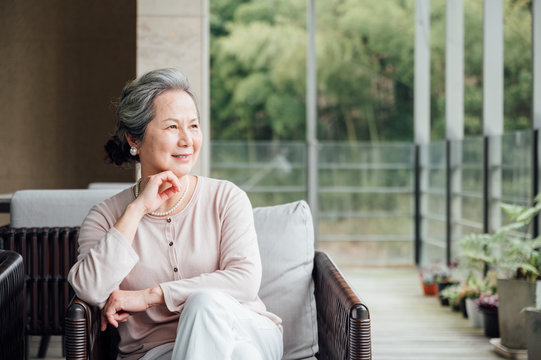 Portrait Of Older Woman In Asia