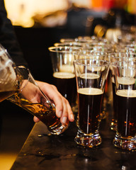 Bartender pouring beer