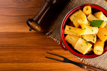 Fried manioc. Brazilian fried cassava concept.