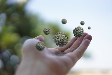 Hand with Bacteria Virus floating around.  The virus floats around us. Germs on hand that we cannot...