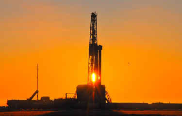 The drilling rig during sunset