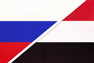 Russia vs Yemen national flag from textile. Relationship and partnership between two countries.