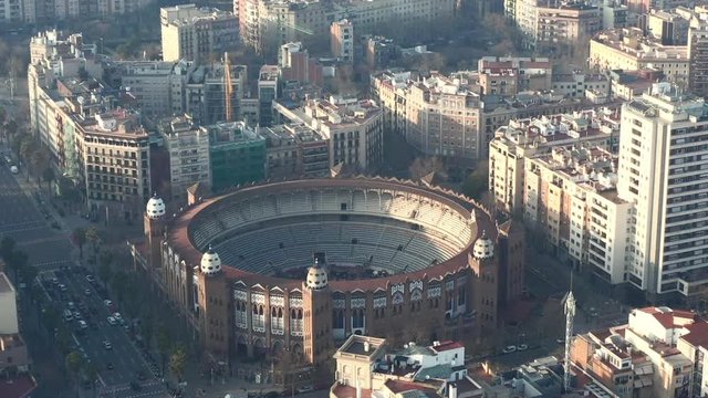 AERIAL: Over La Monumental in Barcelona, Spain on beautiful sunny day 