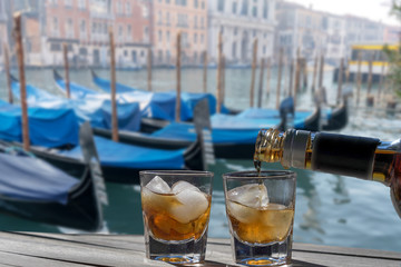 Drink for two in front of the Grand Canal of Venice - Romantic holiday for couples. Two glasses of...