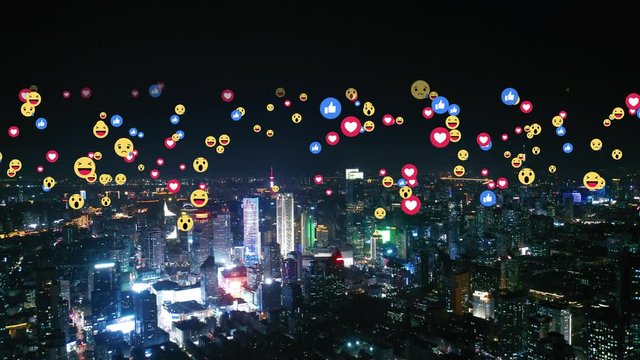 Aerial view of city with emojis