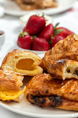 Unrecognizable woman having breakfast in pajamas at home in quarantine