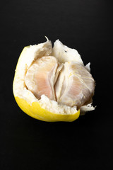 Pomelo fruit on dark background