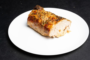 Close up of barbecue meat. Grilled pork on white plate