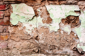 Texture of a concrete wall with cracks and scratches which can be used as a background