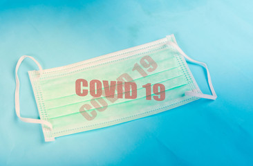 Anti virus protection mask standard to prevent corona COVID-19 flu, dust on a blue background...