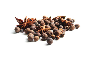 On white background anise, black pepper, allspice. Healthy eating concept. Background to insert text or spice catalog