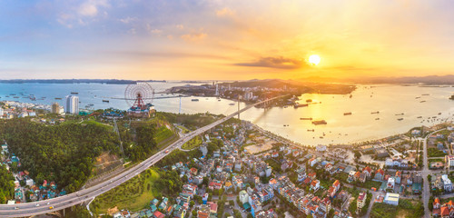 Panorama of Ha Long City, Vietnam, with Bai Chay bridge. Near Halong Bay, UNESCO World Heritage...