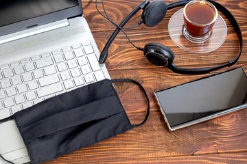 Coronavirus. Quarantine. Online training, education and freelance work. Laptop, phone and medical...