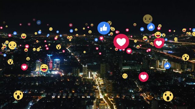 Aerial view of city with emojis