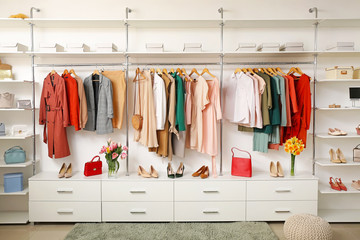 Modern wardrobe with stylish spring clothes and accessories - obrazy, fototapety, plakaty