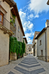 Fototapeta na wymiar A narrow street between the houses of a tourist town in the Abruzzo region of Italy