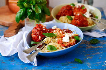 Turkey  meat balls stuffed with feta cheese in tomato sauce