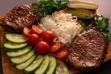 Shashlyk with vegetable and cabbages view