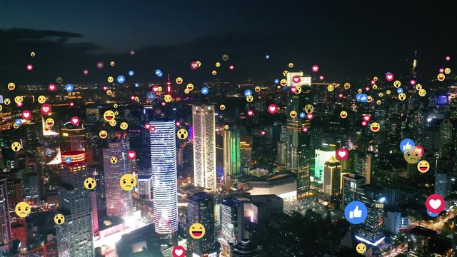 Aerial view of city with emojis