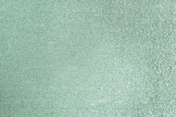 Fototapeta premium Glittery green paper background