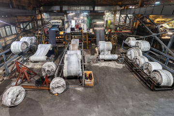 Factory manufacturing rubber conveyor belts.