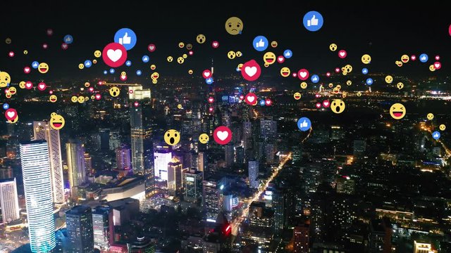 Aerial view of city with emojis