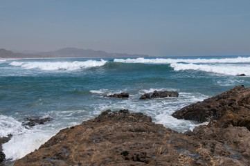 Fototapeta na wymiar waves in the Pacific Ocean reaching Los Cerritos Beach in Todos Santos, near La Paz Baja California Sur, Mexico
