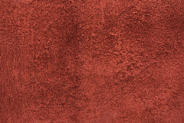 shabby terracotta stucco background with cracks